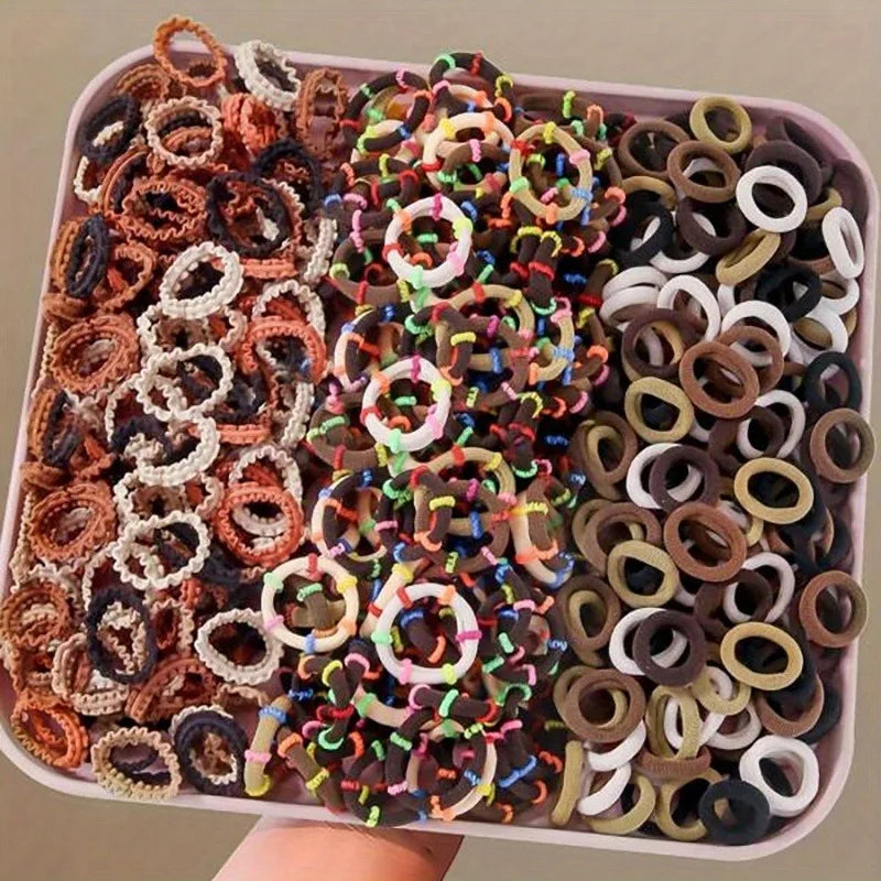 300 Packs of colorful Hair Ties, Durable and Non-Damaging to Hair. Perfect for Cute Girls Using Them for Everyday Ponytails.
