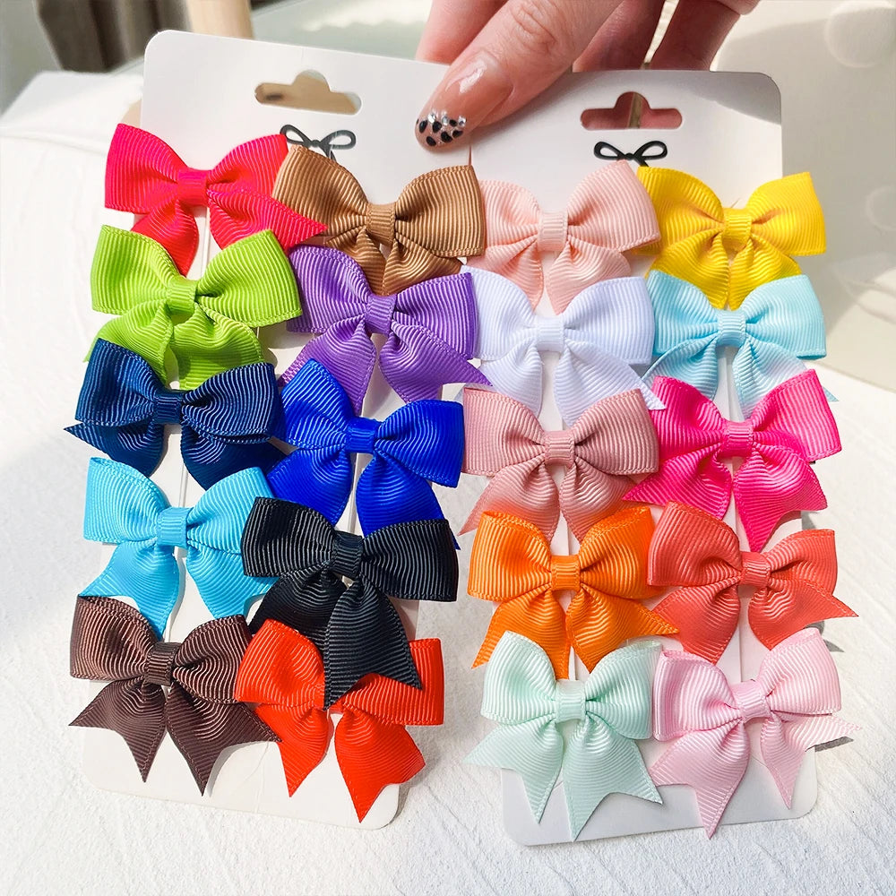10Pcs/Set New Cute Solid Ribbon Bowknot Hair Clips for Baby Girls Handmade Bows Hairpi close-up view