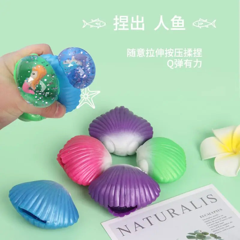 Creative Hand Pinch Shell Decompression Toy Trick Decompression Mermaid Ball Classic T close-up view