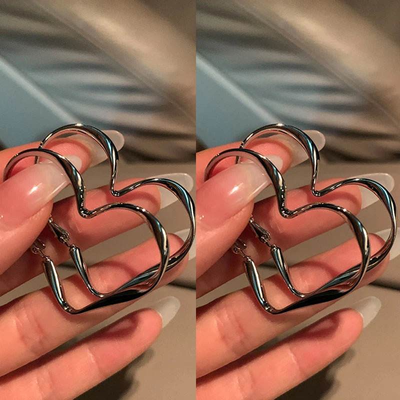 Trendy Hollow Heart Earring Cuff | Fashion Hoop Earrings for Women additional angle