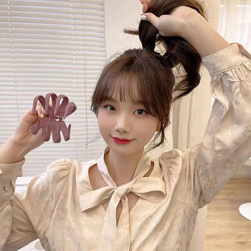 Elegant Solid Pumpkin Shape Plastic Hair Claw For Women Back Head Headband Hair Claw C close-up view