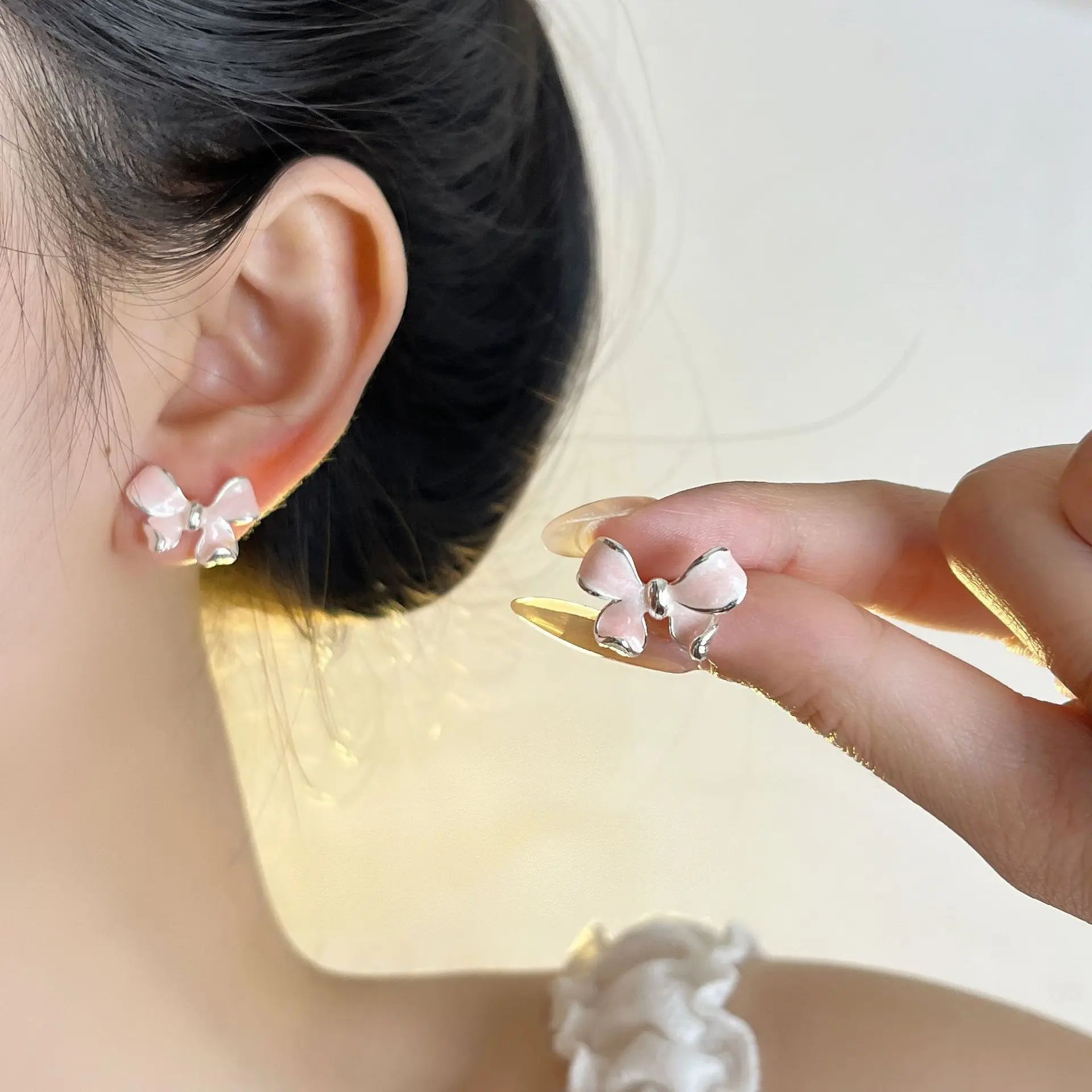 PANJBJ 925 Sterling Silver Bow Knot Earring for Women Texture Tassels Sweet Romantic lifestyle view