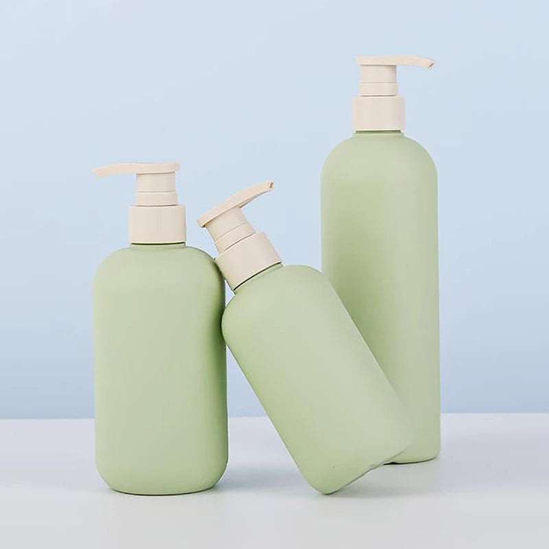 Refillable Foaming Soap Dispenser | Rustproof Plastic Shampoo and Shower Bottle for Ki close-up view