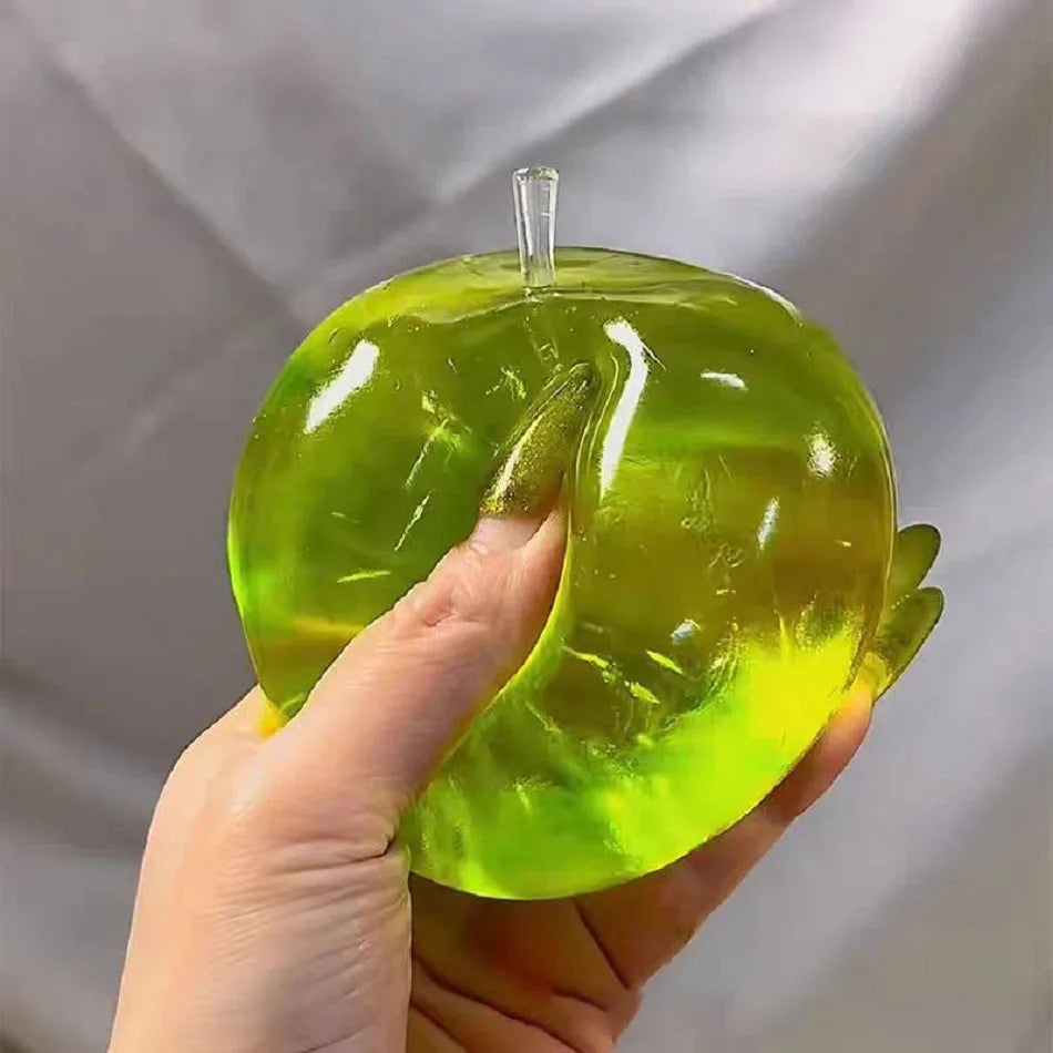 Green Apple Stress Ball | Squeeze Toy for ADHD Autism Slow Rebound Fidget Sensory Toy lifestyle view