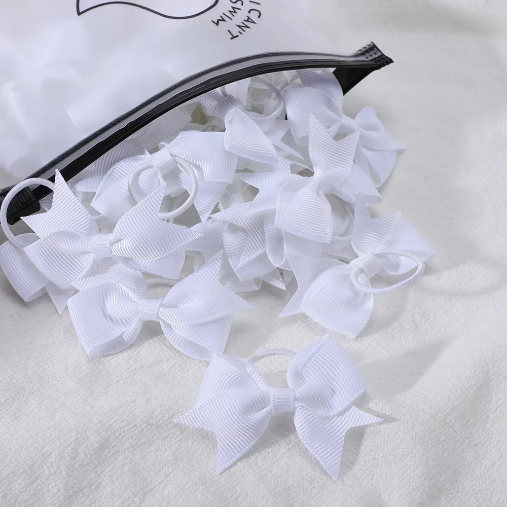 10Pcs/lot Grosgrain Ribbon Pigtail Hair Bows Elastic Hair Ties Hair Bands Holders Girl close-up view