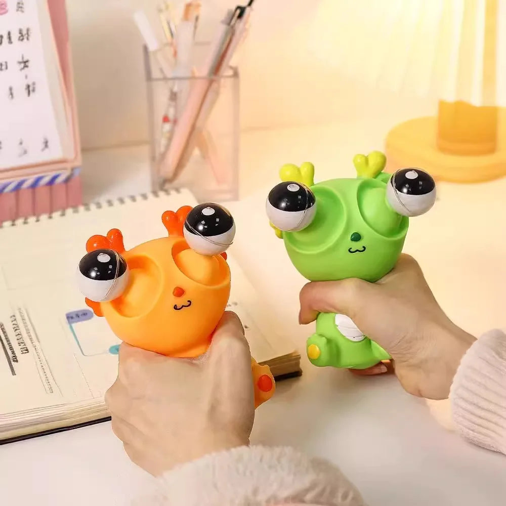 Squeeze Eye Dragon Dinosaur Toy | Funny Stress Relief Animal Toy lifestyle view