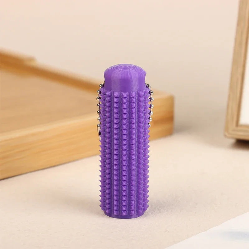 Little Ouchies Pocket-Sized Mini Spiky Grippie Stress Relief Keychain Fidget Toy | An lifestyle view