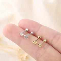 EVSIPOL Tiny Stainless Steel Screw Back Flower Stud Earrings for Women Girls Simple Cu close-up view