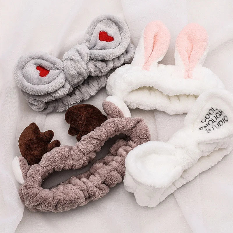 Cute Red Horns Elastic Hairbands for Women Wash Face Sport Soft Plush Rabbit Ears Head close-up view