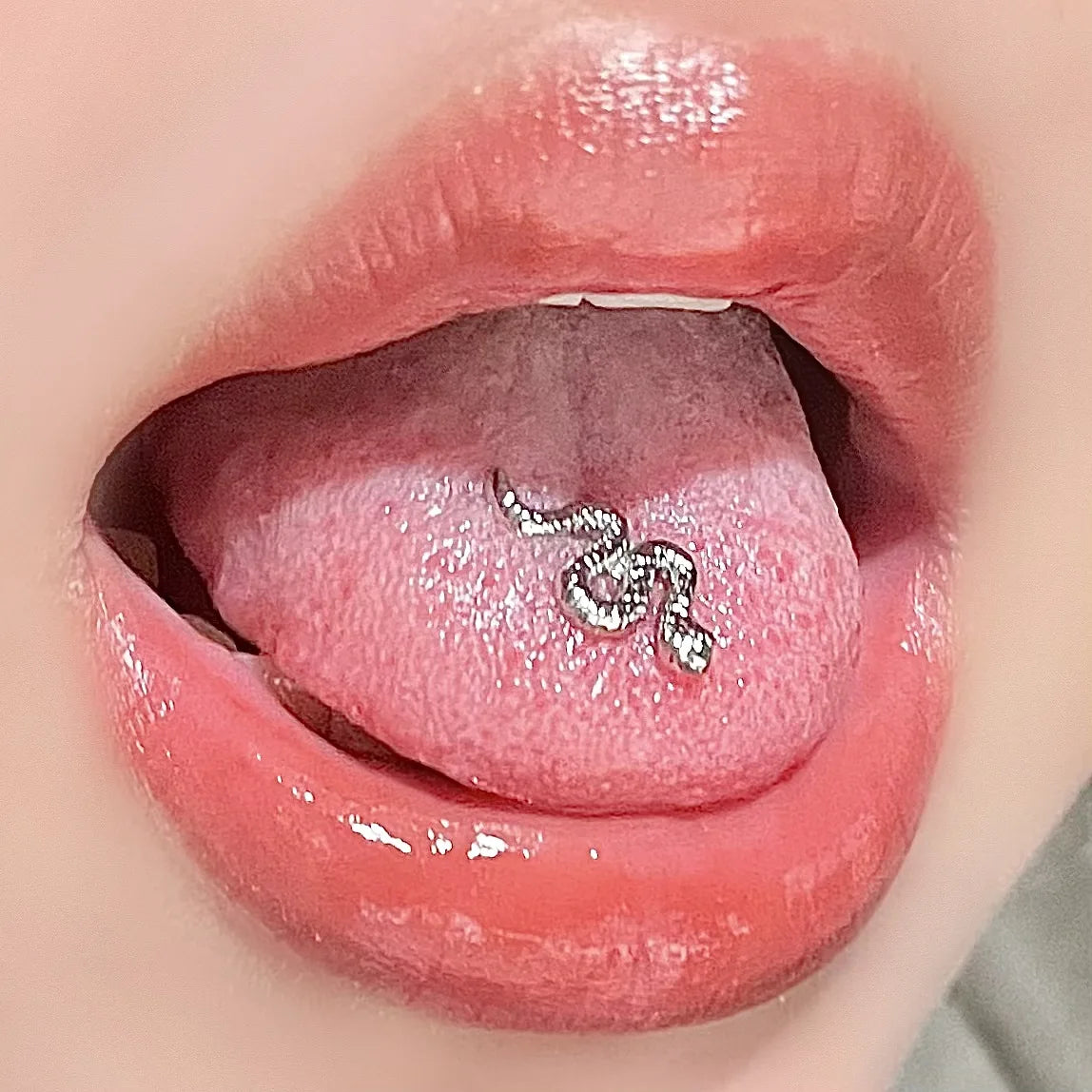 Small snake-shaped earrings, nose studs, titanium steel tongue studs, lip studs,flat-bot detail view