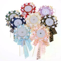 Big Bow Anime Badge Display Rosette With Gold Accents And Butterfly Decor Perfect For close-up view