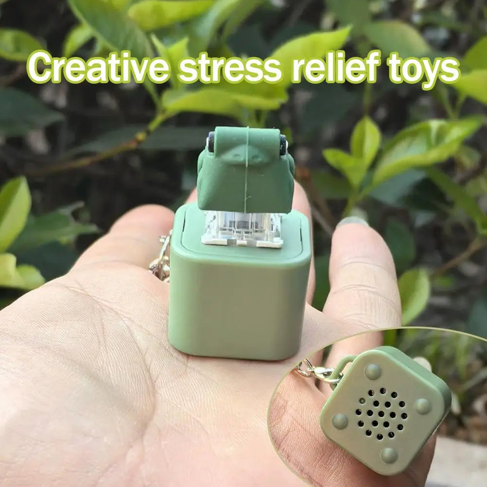 Croaking Frog Fidget Toy Keychain Rechargeable Frog Keychain with Sound & LED Lights, close-up view