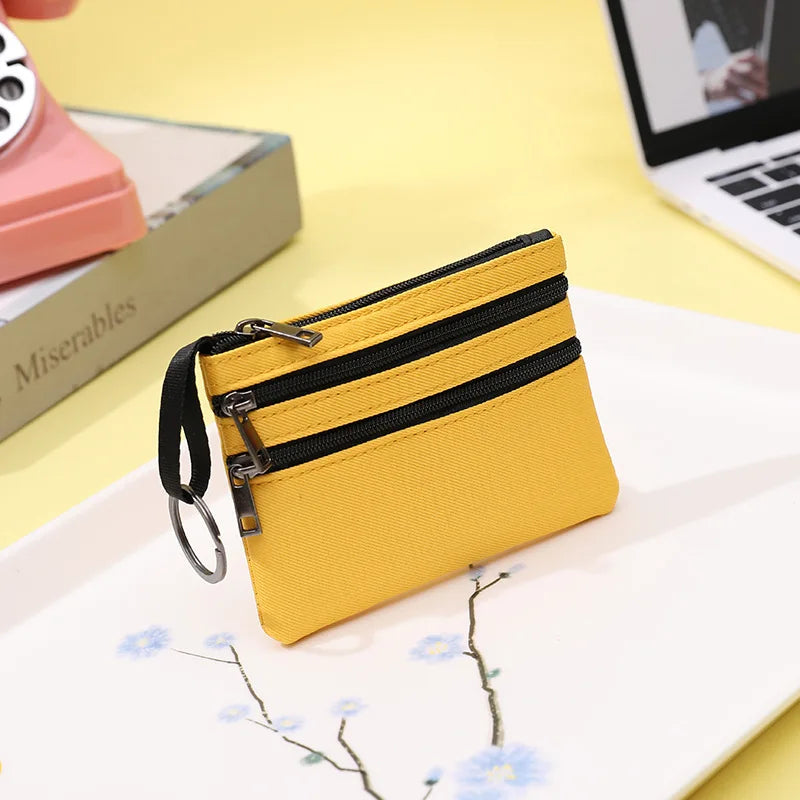 Women Mini Zippers Canvas Coin Purse | Compact Wallet with Keychain close-up view