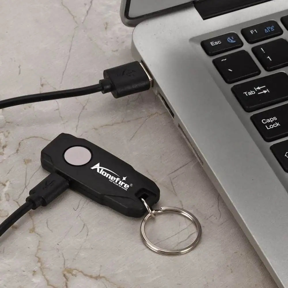 Mini LED Keychain Light | USB Rechargeable Compact Flashlight close-up view