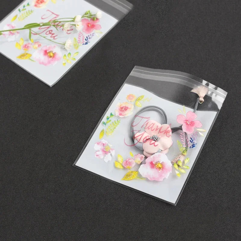 100pcs/lot Plastic Bags Thank you Flower Self-Adhesive Bags for Homemade Cookie Party close-up view