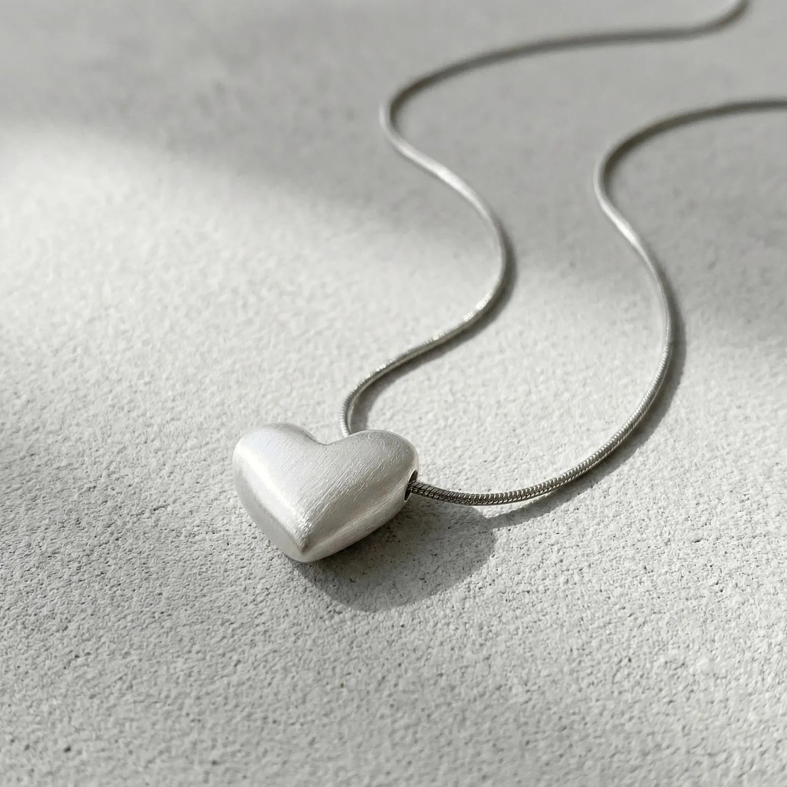 Vnox Minimalism Heart Pendant Snake Chain Necklace for Women Girls, Matte Silver Color close-up view
