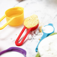Rainbow Measuring Cup Set | Colored Plastic Flour Measuring Spoon Set for Baking close-up view