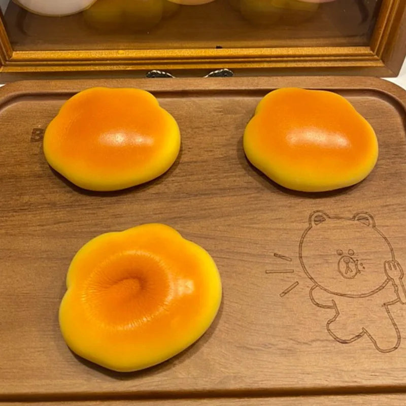 Caramel Cloud Bread Squishy Toy | Slow Rebound Stress Relief Fidget Toy lifestyle view
