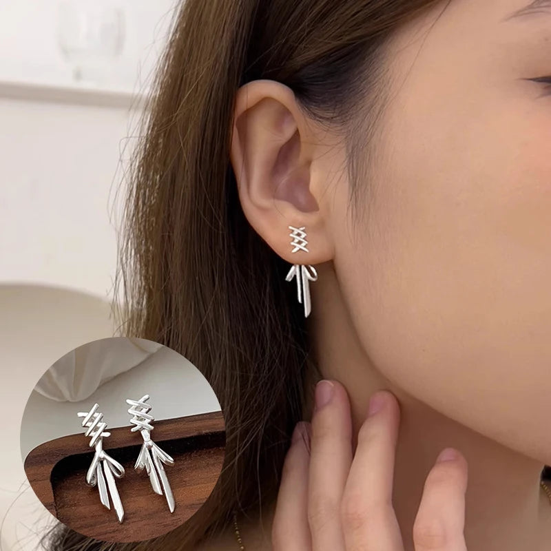 PANJBJ 925 Sterling Silver Bow Knot Earring for Women Texture Tassels Sweet Romantic K close-up view