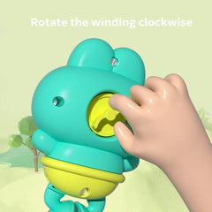 Children's bath toys - Clockwork frogs that float and swim detail view