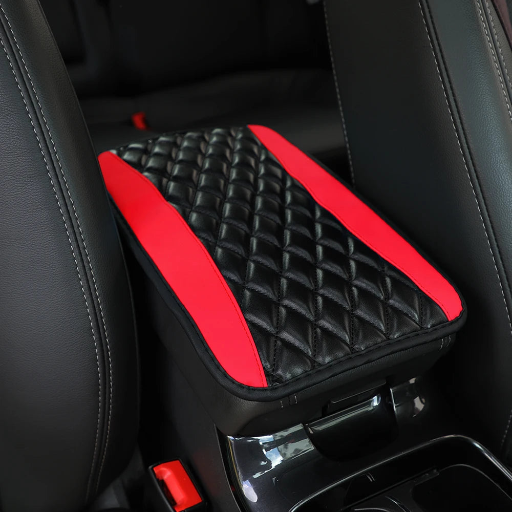PU leather multi-color three-dimensional embroidered car armrest cushion, center conso close-up view