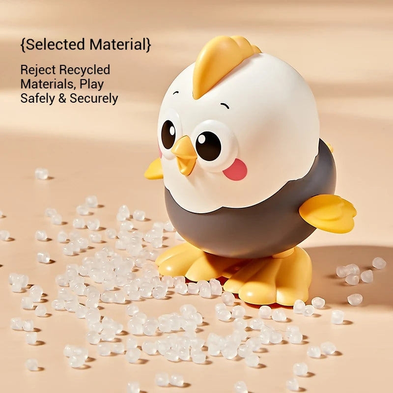 Cartoon Clockwork Chick Toy On Chain Chick Move Jump Little Chicken Baby Move Crawl To close-up view