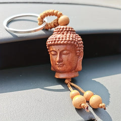 Buddha Head Carved Wood Keychain | Peach Wood Key Ring detail view