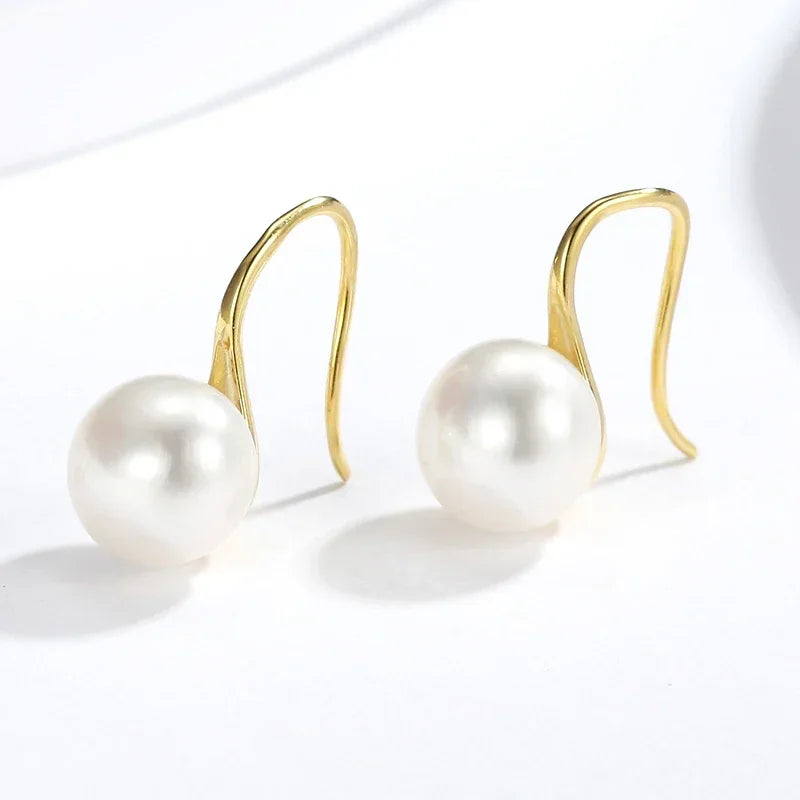 Freshwater Pearl Stud Earrings 8-9mm | AAAA Grade Round Pearl Jewelry for Women lifestyle view