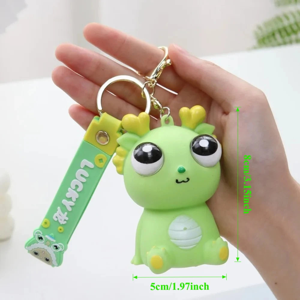Big Eyed Dragon Squishy Toy | Pop Eyes Fidget Keychain for Stress Relief alternate view