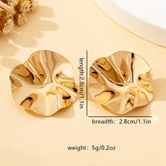 A Pair of Irregular Round Metal Stud Earrings Jewelry close-up view