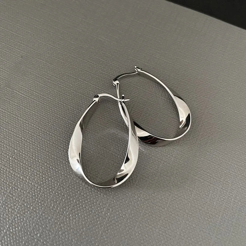 Geometric Twisted Hoop Earrings | Niche Design Statement Jewelry for Women alternate view