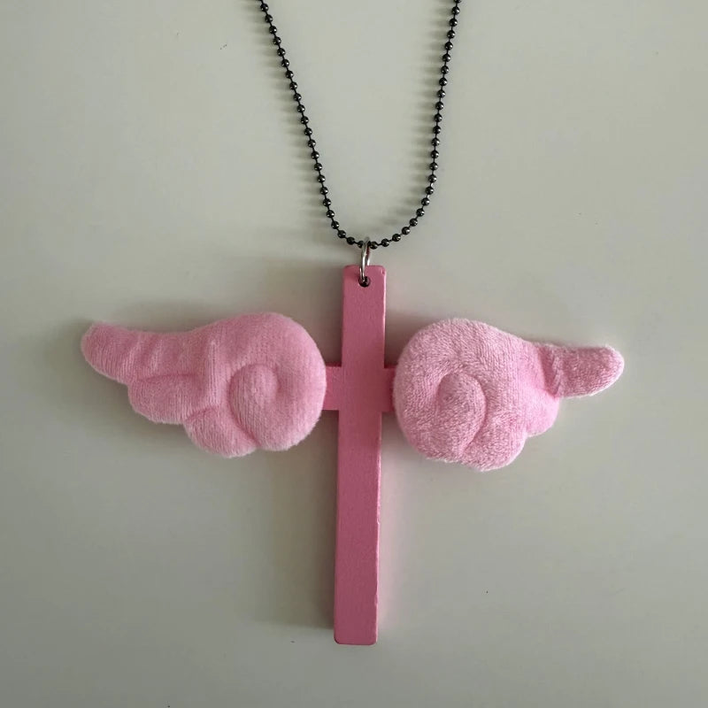 Pink Wing Cross Pendant Necklace | Y2K Gothic Jewelry for Women lifestyle view