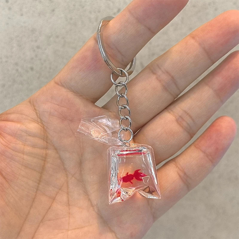Creative Simulation Goldfish Keychain | Transparent Carp Pendant for Backpack lifestyle view