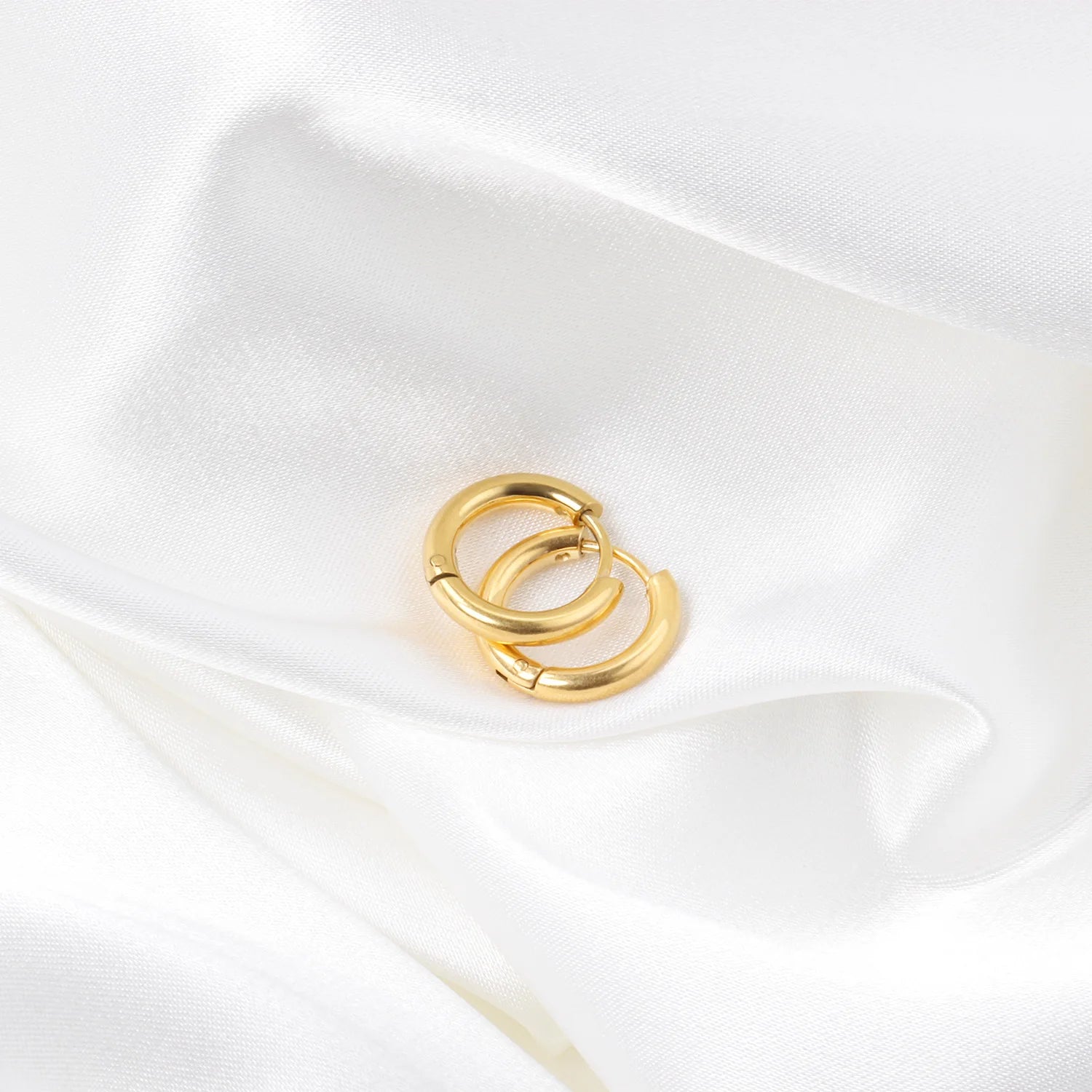 LUXUSTEEL Stainless Steel Hoop Earrings | Simple Geometric Shapes for Women close-up view