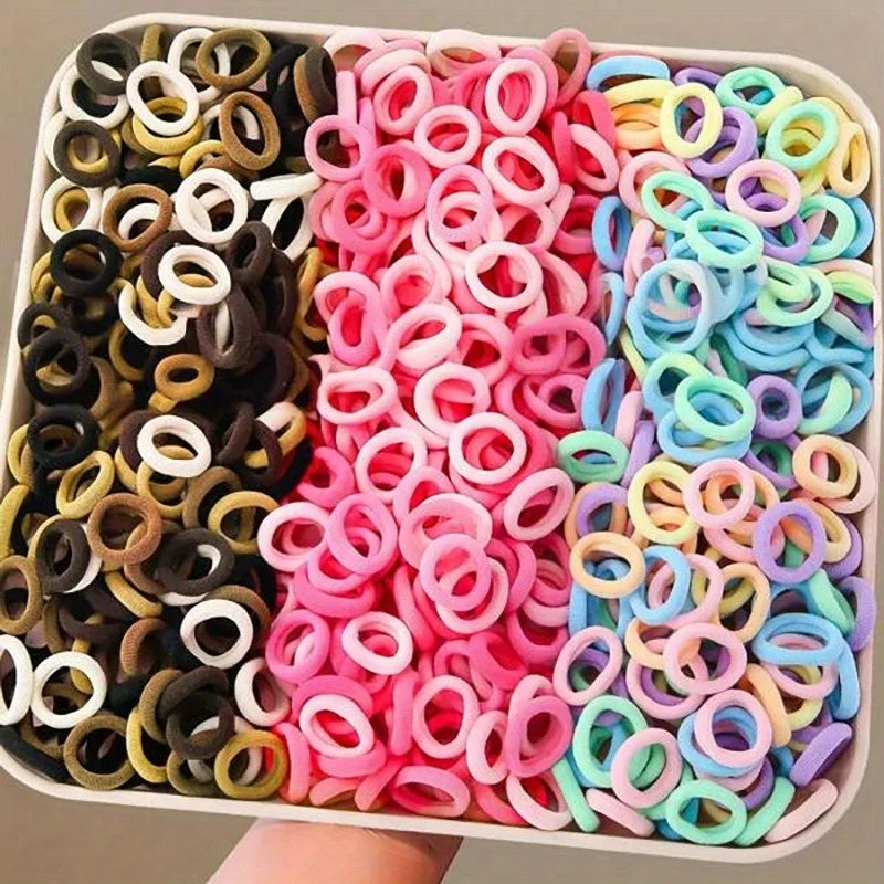 300 Packs of colorful Hair Ties, Durable and Non-Damaging to Hair. Perfect for Cute Girls Using Them for Everyday Ponytails.