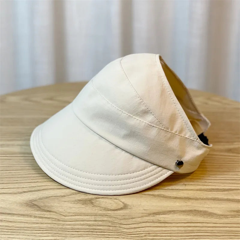 Foldable Women's Sun Hat with Wide Brim and Breathable Top | Ponytail-Friendly Design lifestyle view