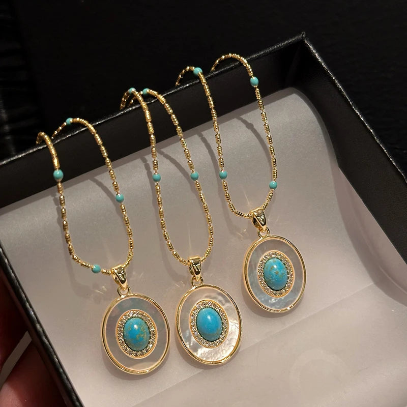 Natural Turquoise Oval Shell Pendant Necklace | Gold Chain Collarbone Jewelry lifestyle view