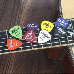 10-200Pcs Guitar Pick Original Sound Electric Bass Moderator Guitars Accessories Music close-up view