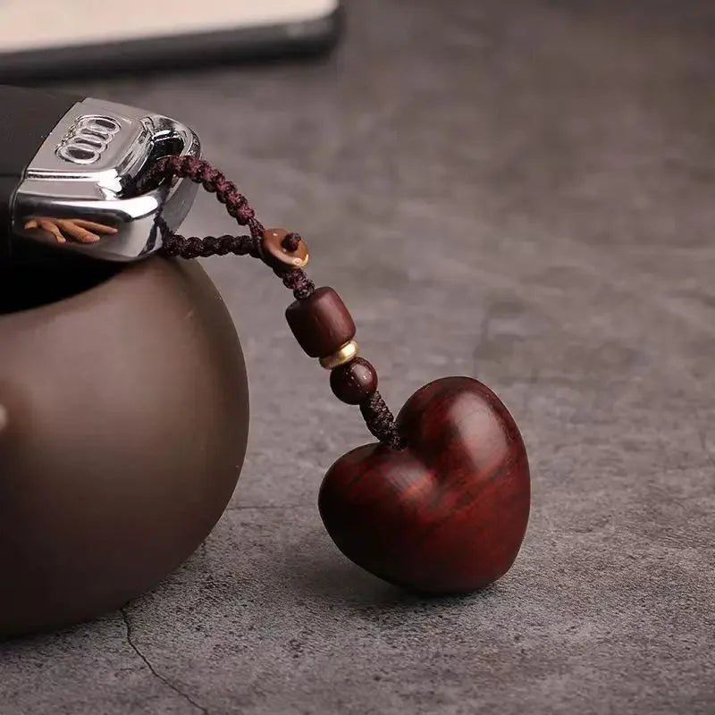 Creative Simple Rosewood Red Love Keychain | Hand-woven Solid Wood Phone Charm for Co lifestyle view