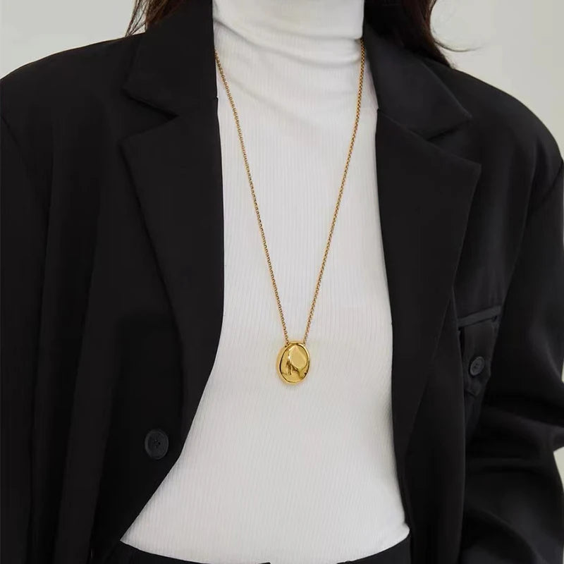 Taoya Stainless Steel Gold Color Oval Pendant Necklace | Fashion Jewelry for Women close-up view