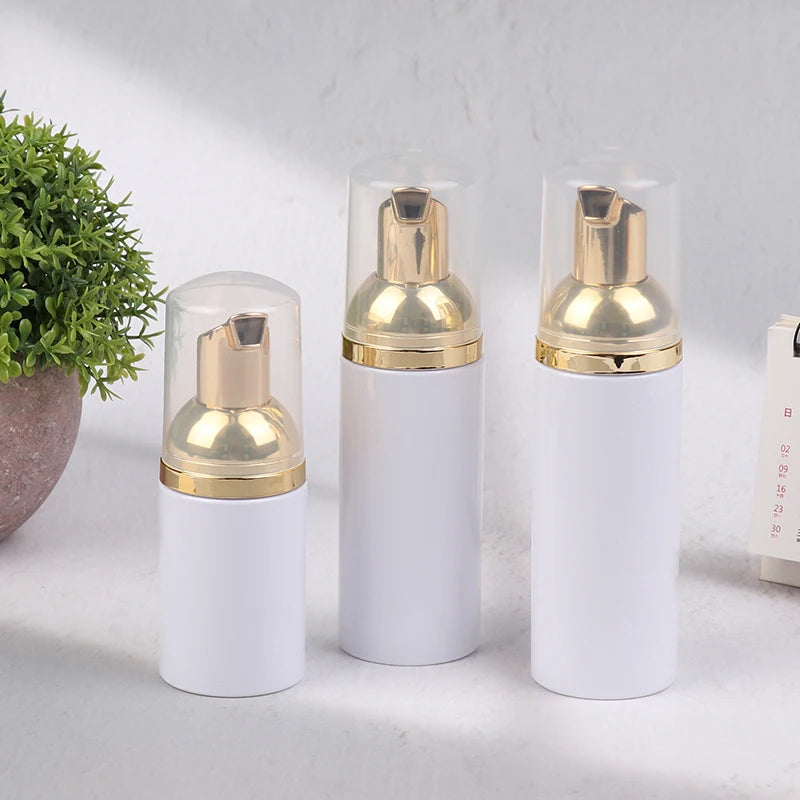 30/50/60ML White Gold Plastic Foamer Pump Bottle Refillable Empty Face Lashes Cleanser close-up view