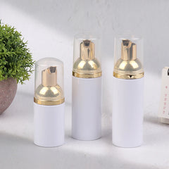 30/50/60ML White Gold Plastic Foamer Pump Bottle Refillable Empty Face Lashes Cleanser close-up view