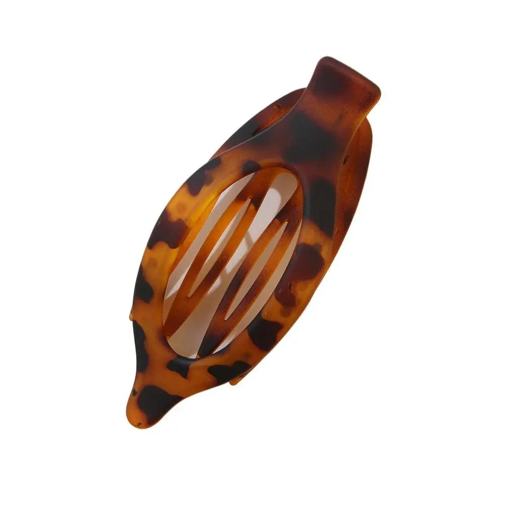 Grote Plastic Haarklauw Clip Matte Kleur Haarklemmen Grip Holte Ovale Geometrische Barre detail view