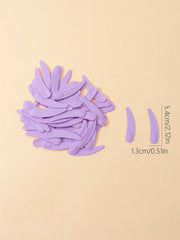 Plastic Face Cream Spoon Set | 50-Pack Crescent Spoons for Skincare close-up view