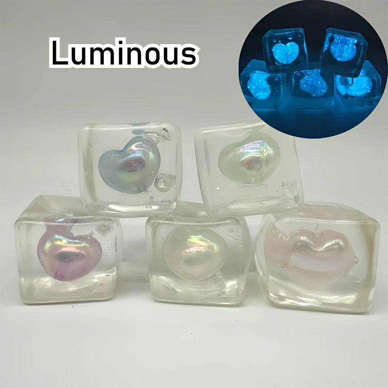 Glowing Heart Squishy Toy | Stress Relief Mochi That Shines at Night close-up view
