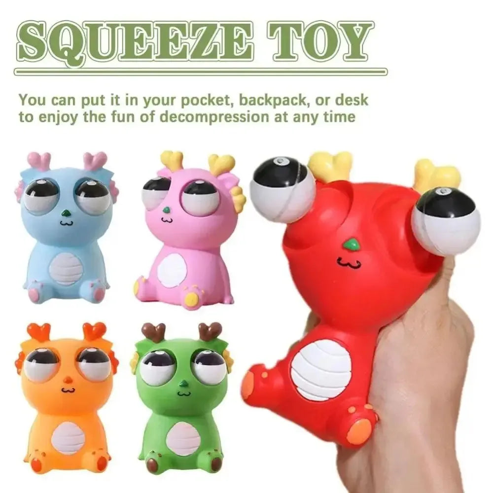 Big Eyed Dragon Squishy Toy | Pop Eyes Fidget Keychain for Stress Relief lifestyle view