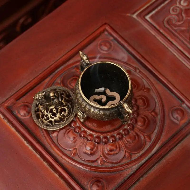 Metal Incense Burner Ornaments | Zen Sandalwood Tower Incense Holder for Home close-up view