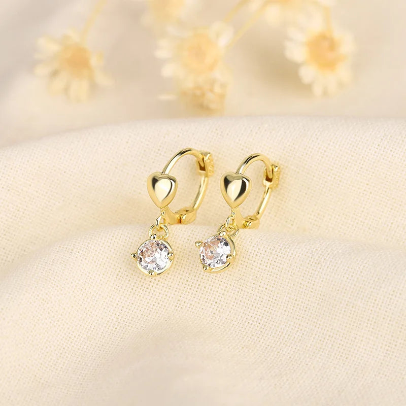 Luxury Golden Heart Earrings Small Exquisite Elegant Clip-On Earrings For Women Tragus close-up view
