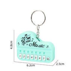 1 Pcs Creative Mini Electronic Piano Keychain Pendant Luminous Music Toy Small Gift close-up view