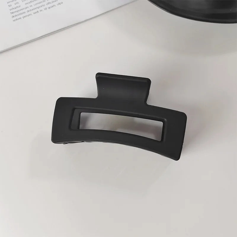 Women Elegant Black Geometric Plastic Hair Claw Lady Sweet Long Hair Holder Toothed Ha close-up view